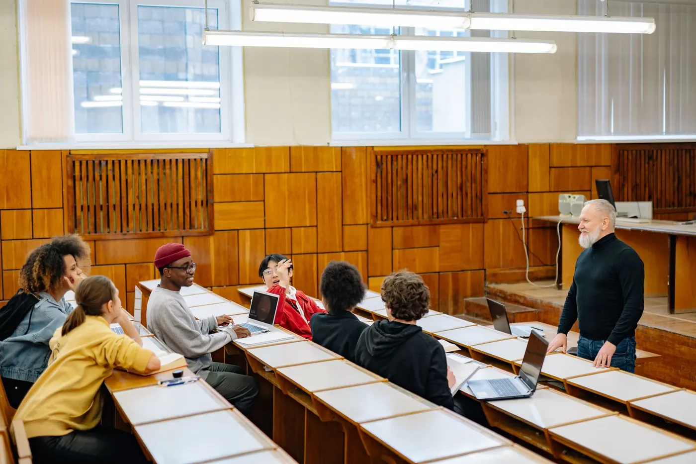 Older students discussing ideas together in class